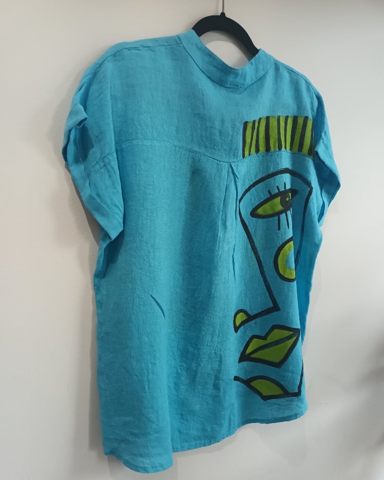 Image of turquoise linen painted top