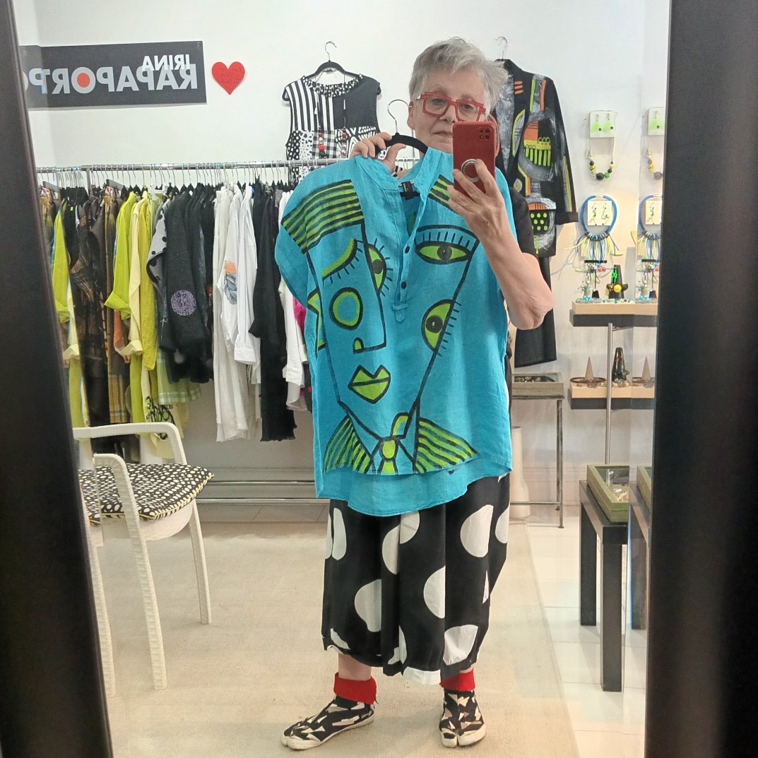 Image of turquoise linen painted top