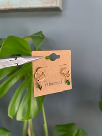 Image 1 of Golden Green Gem Huggies