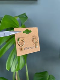 Image 3 of Everyday Gold Star Hoop Earrings