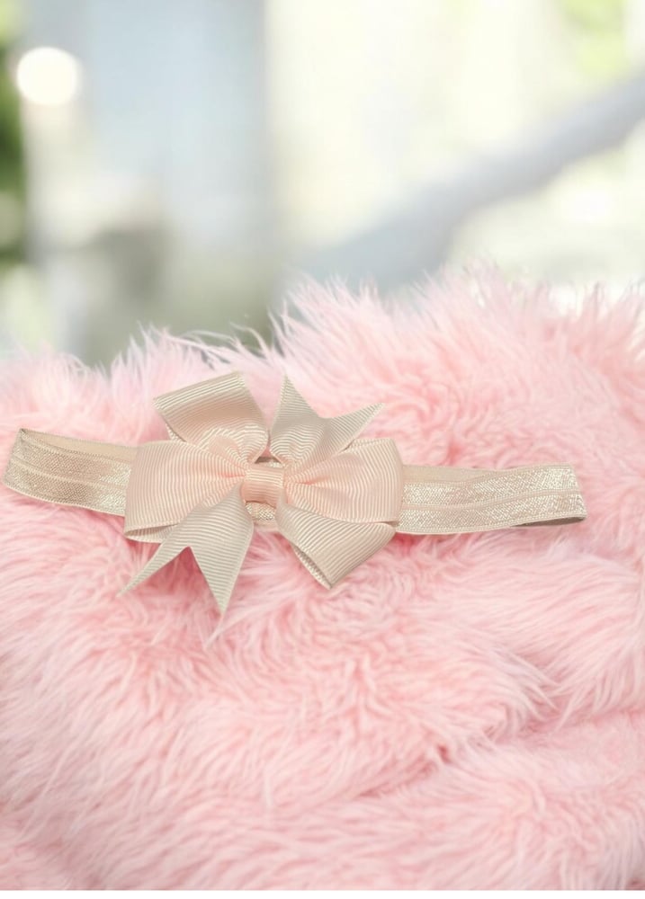 Image of Adorable Baby Bow| Upgrade Your Mini Fashionista's Look| Cute baby bow| Sweet bow| Charming baby bow