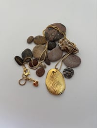 Image 1 of Collar oval pequeño Texturas