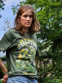 Image 1 of Bella '25 King Kong in the Highlands Adult T-shirt (Military Green)