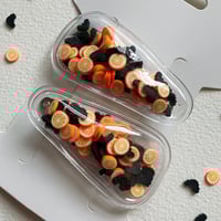 Image 2 of Citrus Bat Shaker Clips
