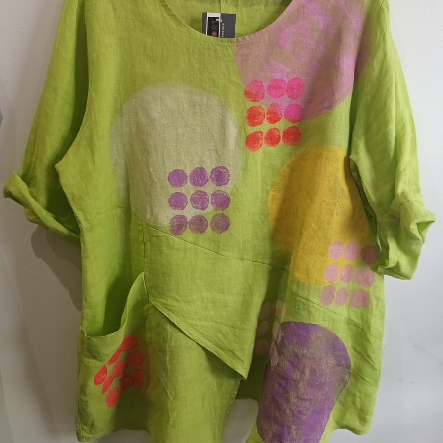 Image of lime green painted tunic