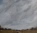 Image of Nuages au-dessus d'une route de campagne