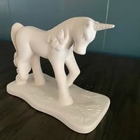 Unicorn with Flowered Base