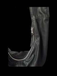 Image 1 of  the black round bag