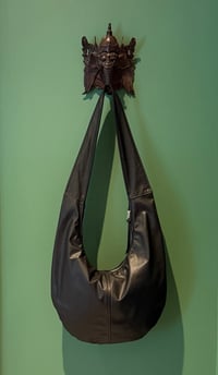 Image 4 of  the black round bag