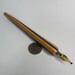 Image of 1/2” skateboard  nib holder 
