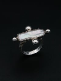 Image 1 of Pearl Axis