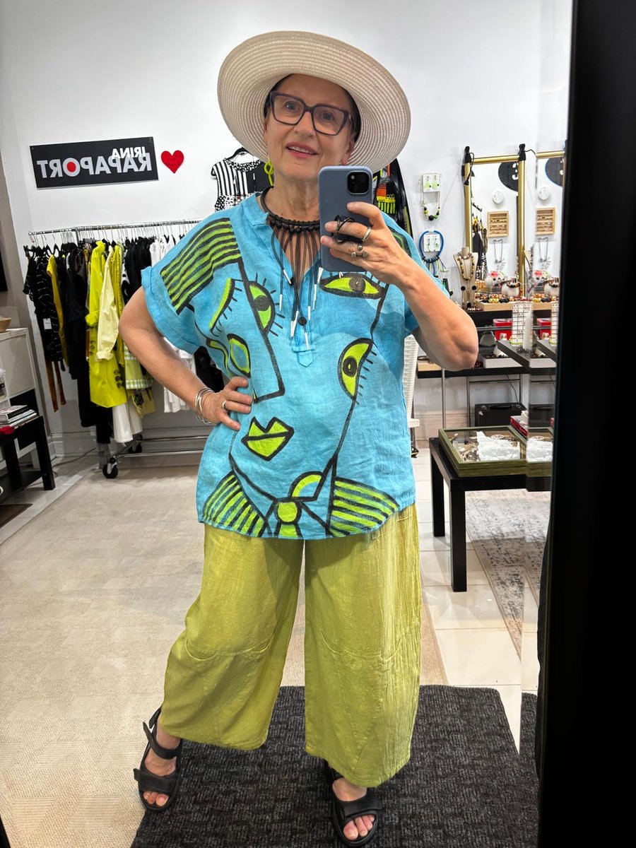 Image of turquoise linen painted top