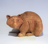 Image 1 of Raccoon. Carved figurine from wood