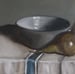 Image of Poires et bol sur une nappe rayée