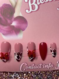 Image 2 of Cow print red bow 