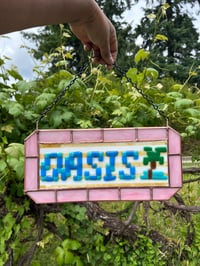 Image 1 of Desert oasis sign