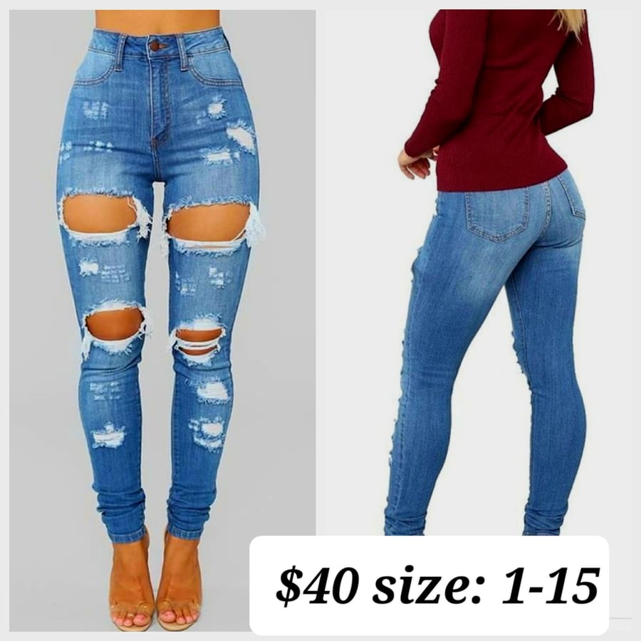 Image of Medium washed ripped jeans