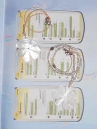 white tiare flower necklaces