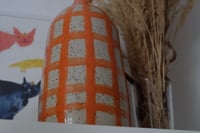 Image 4 of Orange vase.
