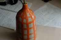 Image 1 of Orange vase.