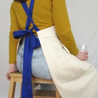 Image 10 of Split Leg Pleated Pinafore Apron with Adjustable Crossback Straps. No25 Undyed Canvas