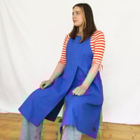 Image 9 of Pleated Split Leg Apron with Adjustable Crossback Straps. Mustard Canvas No25