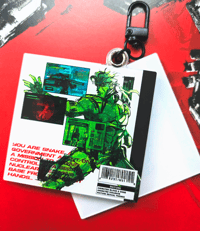 Image 2 of MGS - SOLID SNAKE CD CHARM