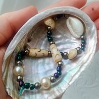Image 1 of Peal, Seashell and Tagua Nut Bracelet (Cowrie and Button Top Shells)