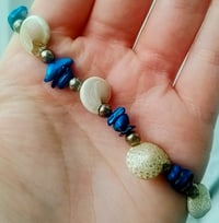Image 3 of Dyed Blue Mother of Pearl and Button Top Seashell Bracelet