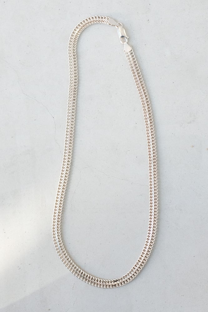 A LANGUAGE INTERWOVEN WITH SILVER 
So that you may quilt your scattered pieces together,
And, in time, find yourself whole again.



WOVEN Necklace is made with a pure sterling silver chain with a slim flat woven structure profile and is available in two lengts 44,5 cm and 50 cm long. 
On request we are able to make other lengths as well.

This piece is timeless in it's look and standing out with its elegance.

 It looks delicate when used as a solitaire and bold when...