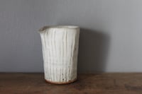 Image 2 of Pourer and cup set.