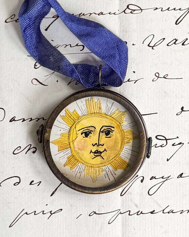 Cassandra Sun ~ original collage in porthole locket