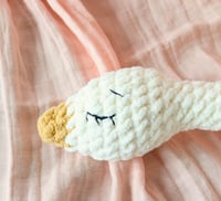 Image 2 of Crocheted Sleepy Goose Doll with Embroidered Eyes – Soft & Snuggly