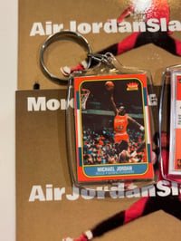 Image 1 of 1986 Fleer Jordan Keychain/Tree Ornament 