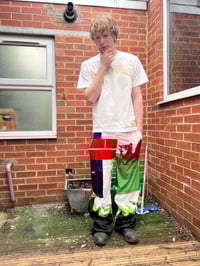 Image 4 of welsh cycling top patchwork trousers 1/1