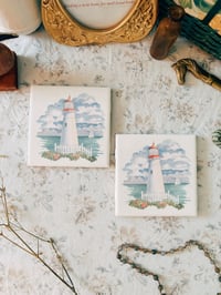 Image 1 of lighthouse coasters