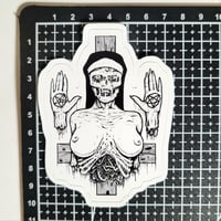 Image 2 of Dismembered Satanic Nun Nailed To An Upside-Down Cross Matte Vinyl Sticker