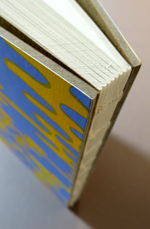 Notizbuch mit offener Fadenheftung