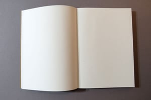 Notizbuch mit offener Fadenheftung
