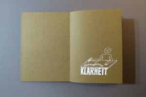 Notizbuch mit offener Fadenheftung