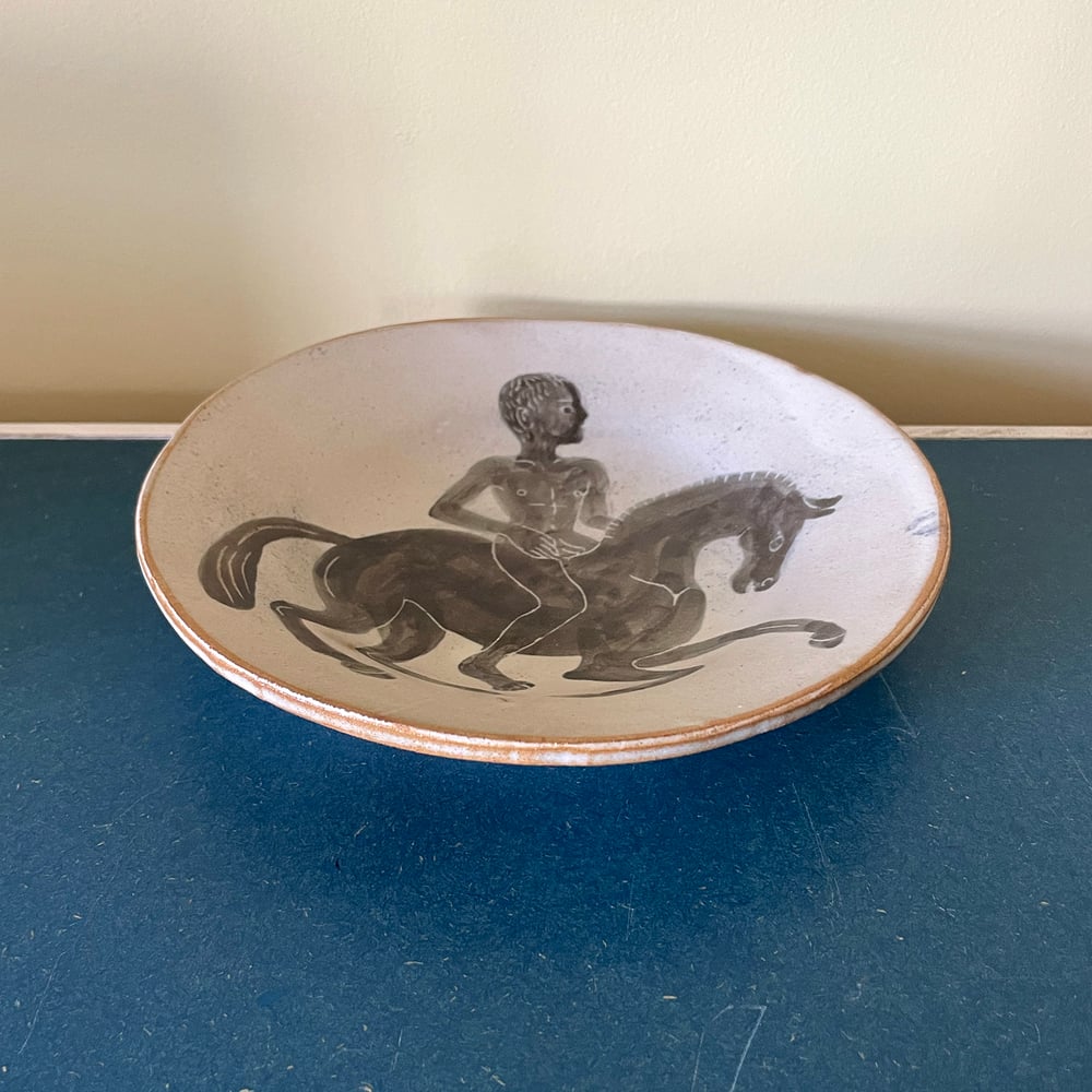 Naked man on a horse 1