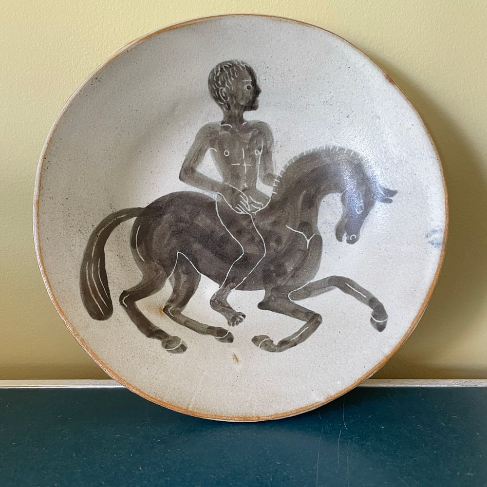 Naked man on a horse 1