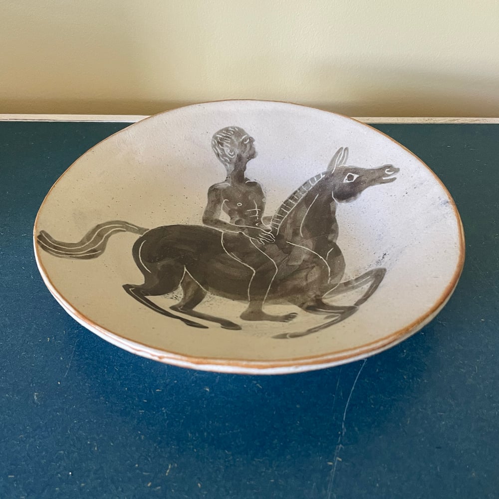 Naked man on a horse 2