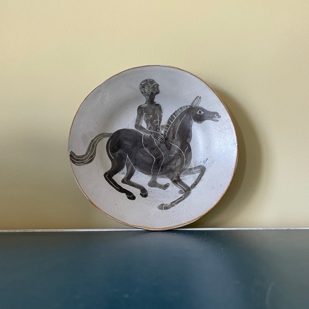 Naked man on a horse 2