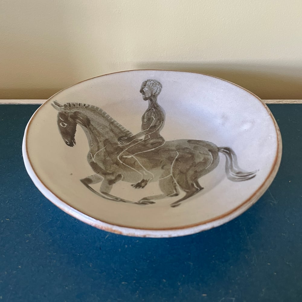 Naked man on a horse 3