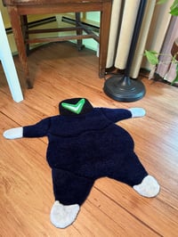 Image 1 of Dark wobble rug