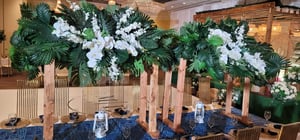 Image of Green leaves  and white runner  staging  design  - Silk flowers 