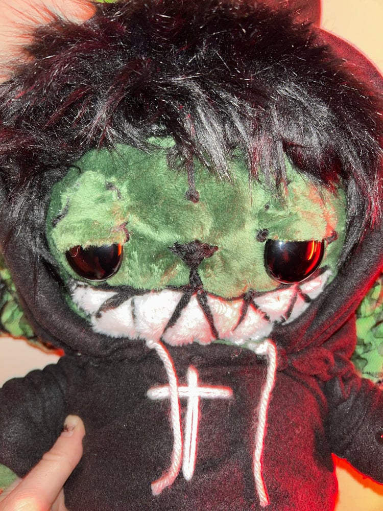 Image of Sinister Grinz Trash