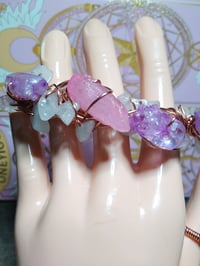 purple 3 finger ring