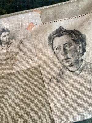 Image of portrait sketch collage pouch